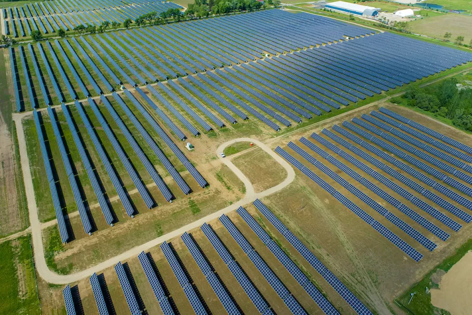 Aerial view of large solar panel installation in rural area in Indiana.